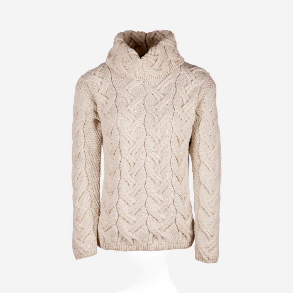 Beige cable knit sweater on a white background