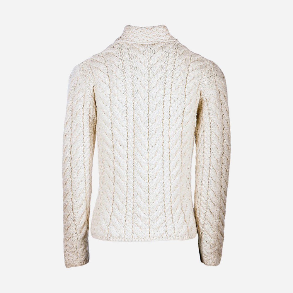 Cream-colored cable knit sweater on a white background