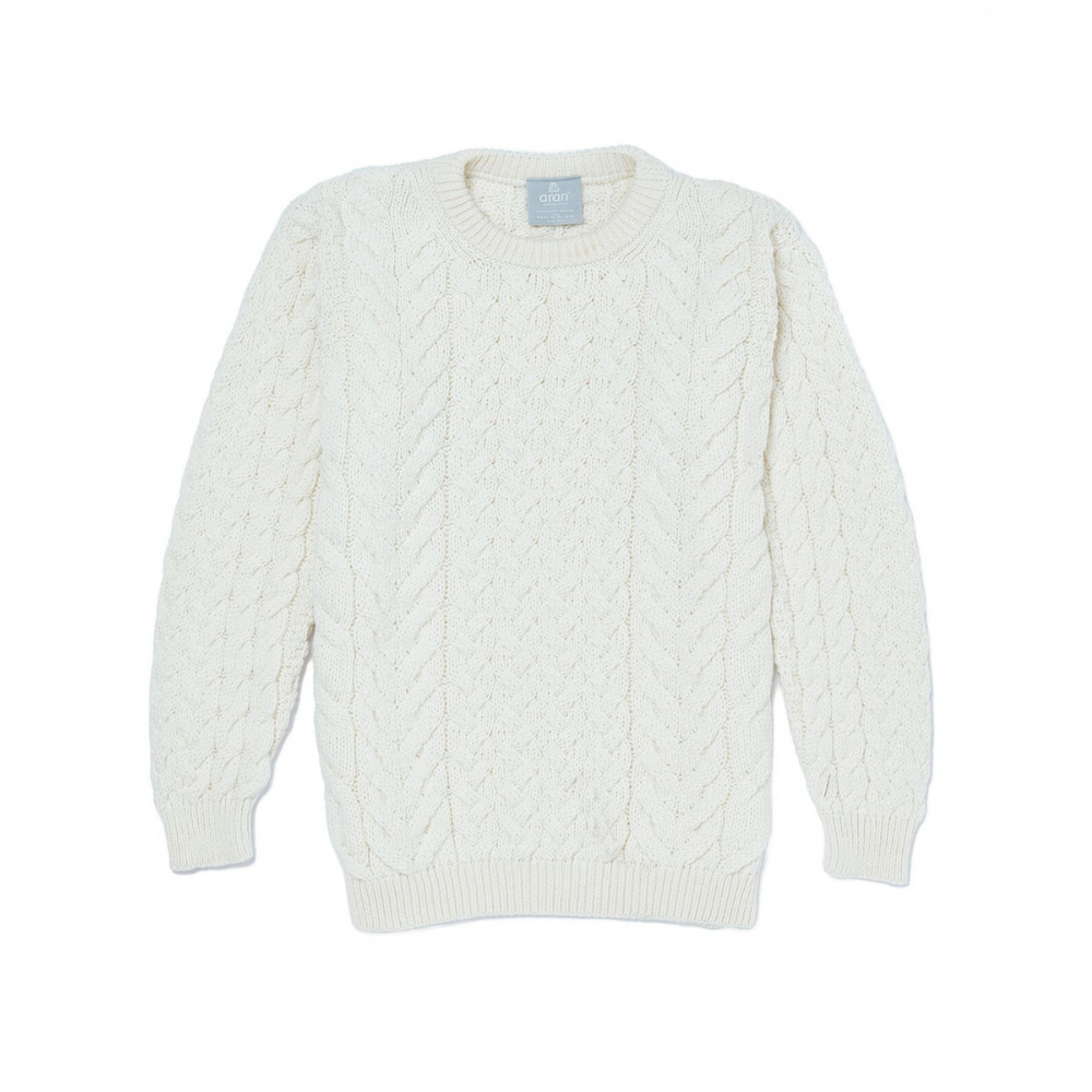 A beige crew neck sweater with a classic Aran cable pattern.