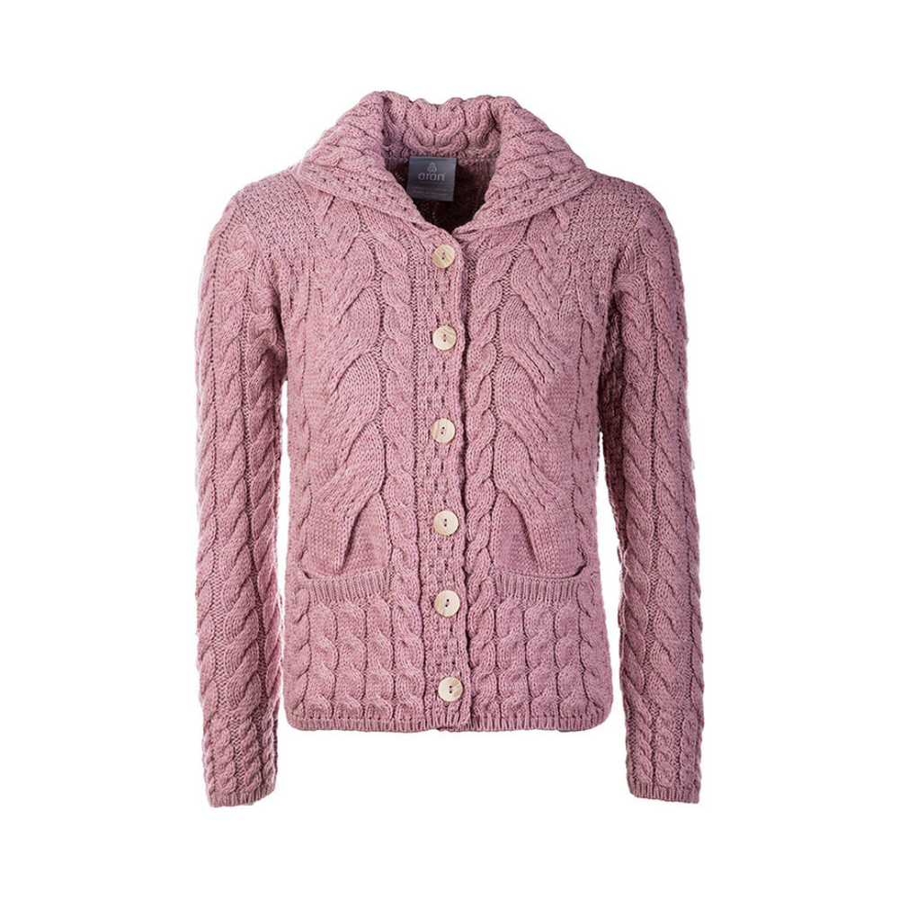 A pink cable knit button-up cardigan.