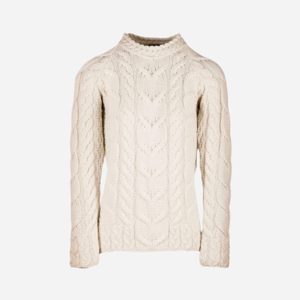 Beige cable knit sweater on a white background