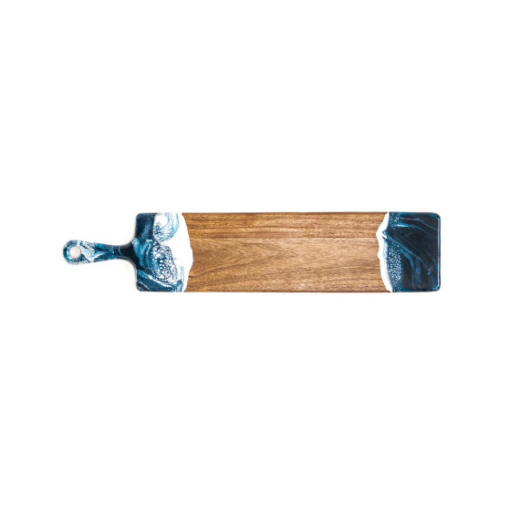 This baguette board made of Acacia wood and crafted with natural eco-friendly navy/white/metallic epoxy