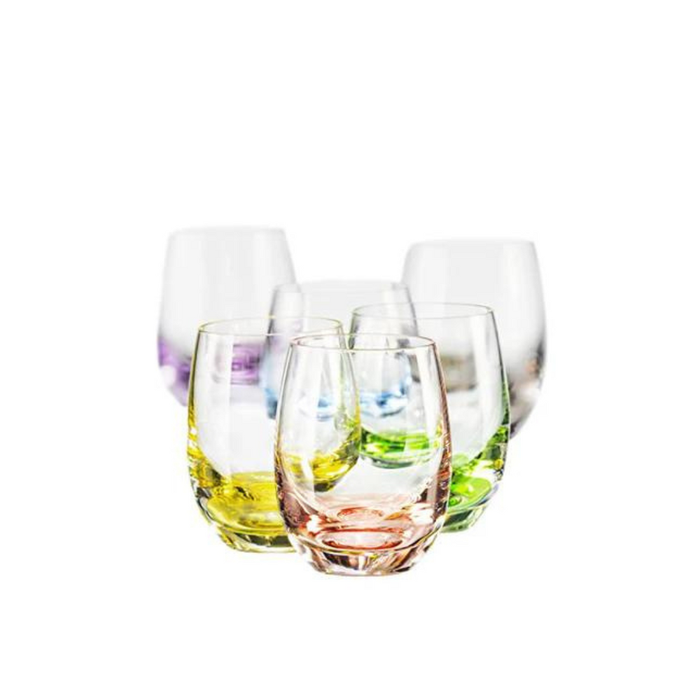 A set of Bohemia Rainbow stemless glasses with different colored bases.
