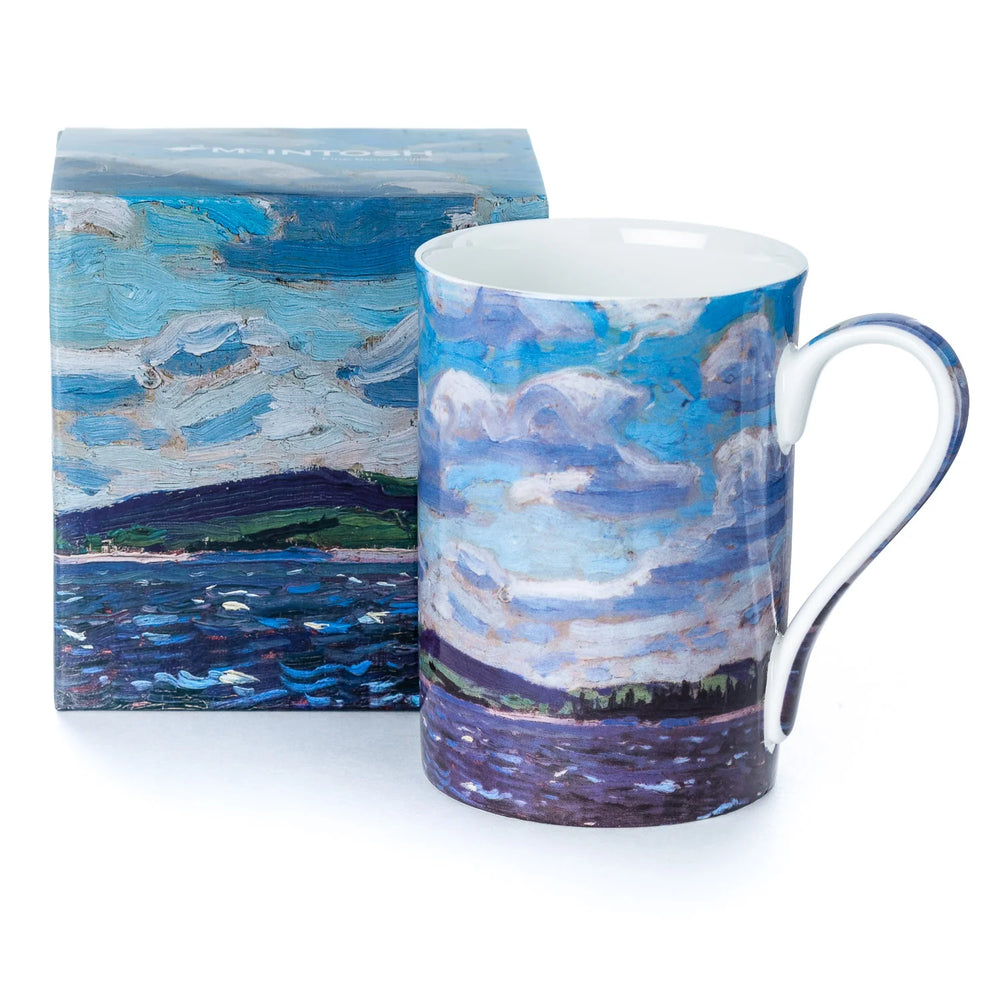 A fine bone china mug with a landscape painting artwork, alongside its packaging box.
