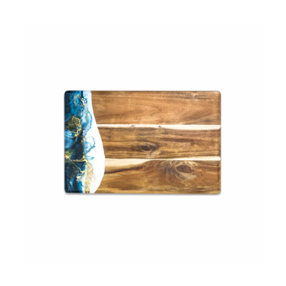 An acacia wood bread board with a blue and gold resin accent, part of the Lynn & Liana Sapphire Sky collection.