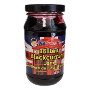 Jar of Brilliant Blackcurrant Jam with a tartan label on a white background