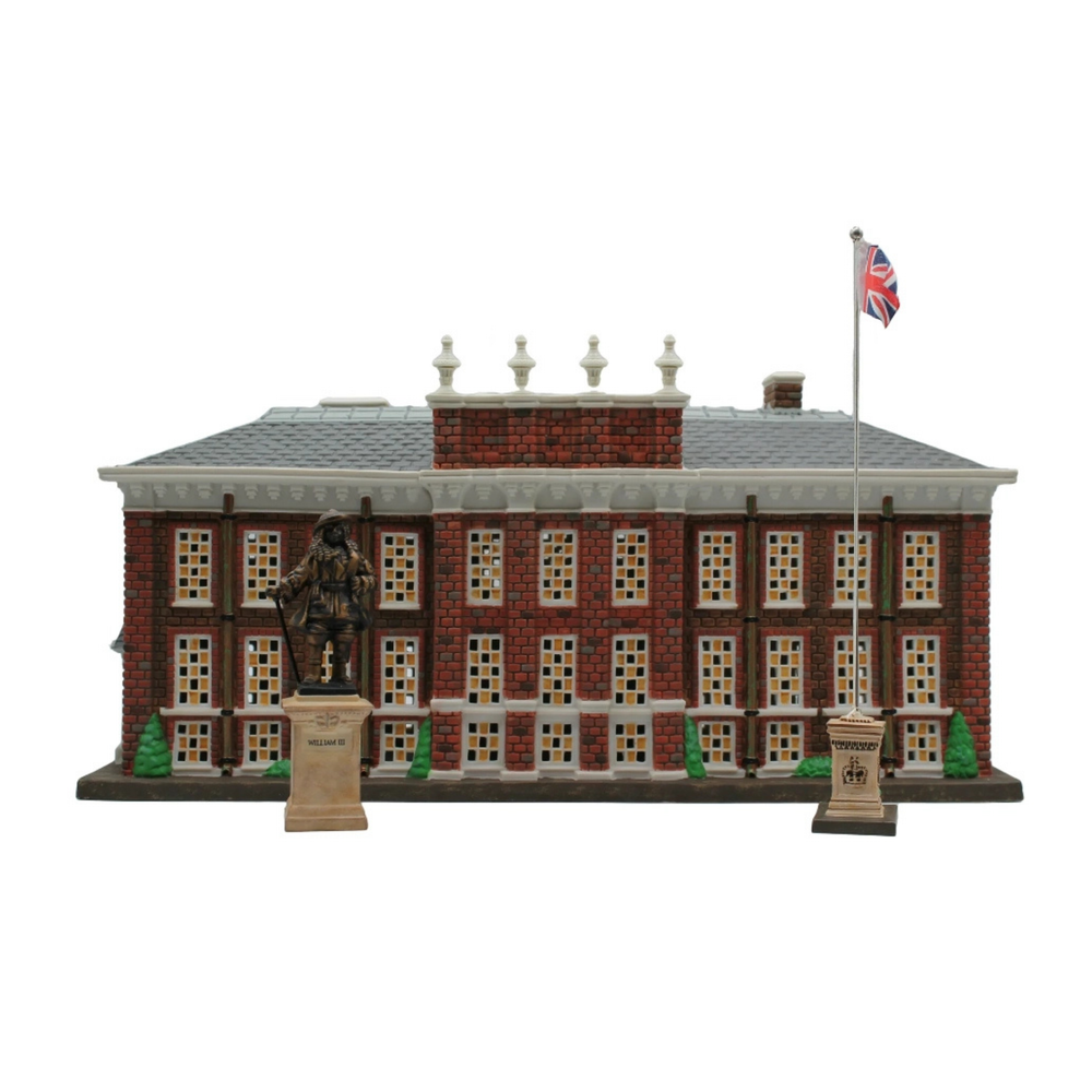 A decorative building with a union jack flag and a statue at the front. A building with lots of windows, set against a white back drop.
