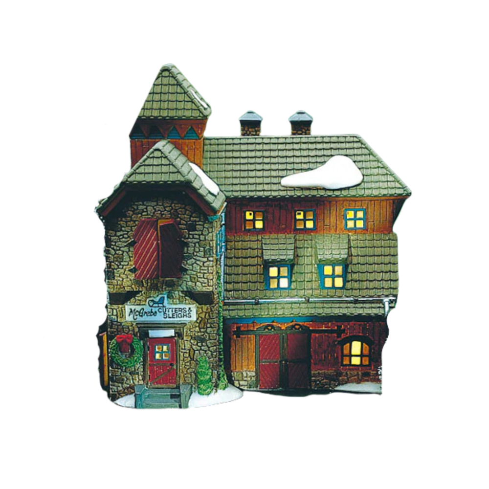 Decorative model of a village house with a snowy base on a white background