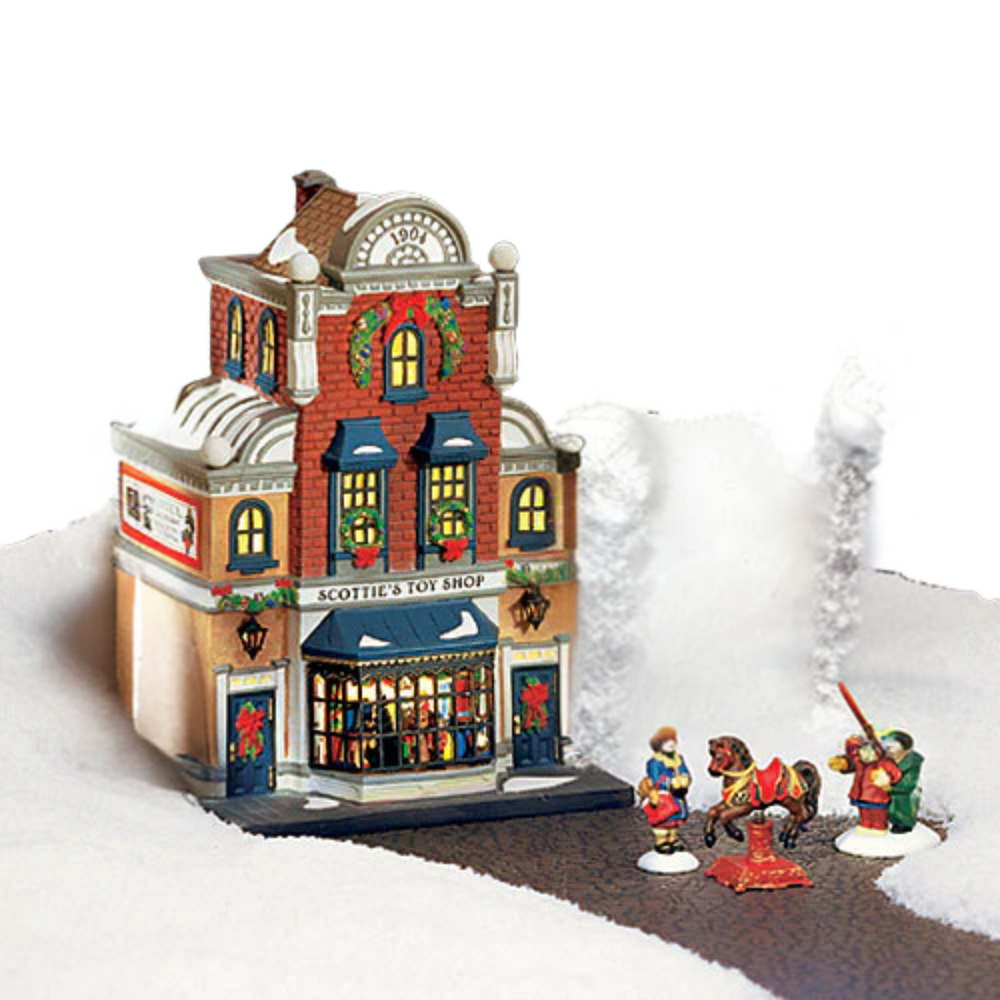 Model toy shop with two figures on a snowy base