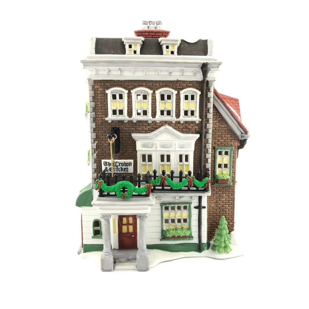 Model of a two-story building with decorative elements on a white background