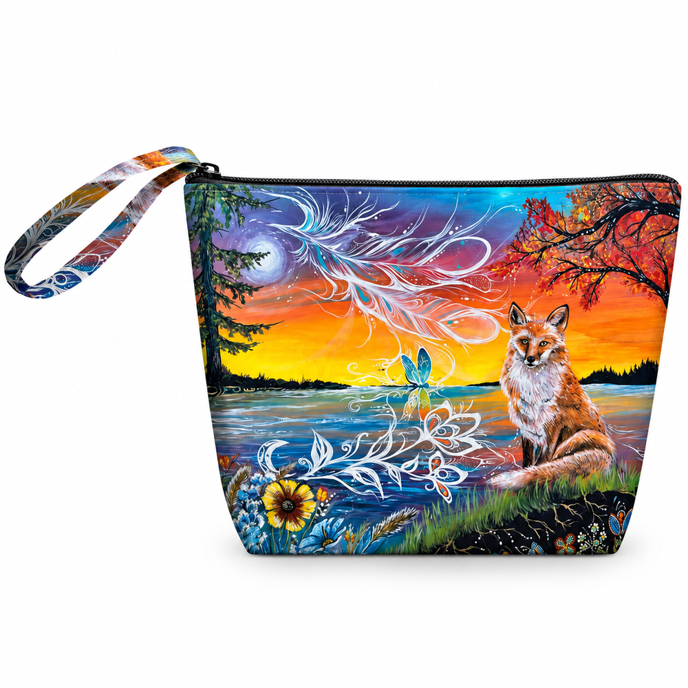 A zippered pouch with a wrist strap, featuring a vibrant, colorful nature illustration of a fox by a lake at sunset, on a plain white background.