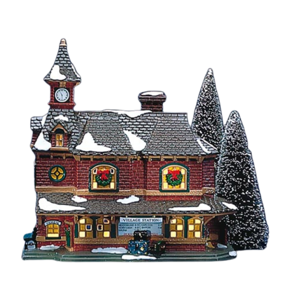 Christmas-themed village station with clock tower and trees on a white background