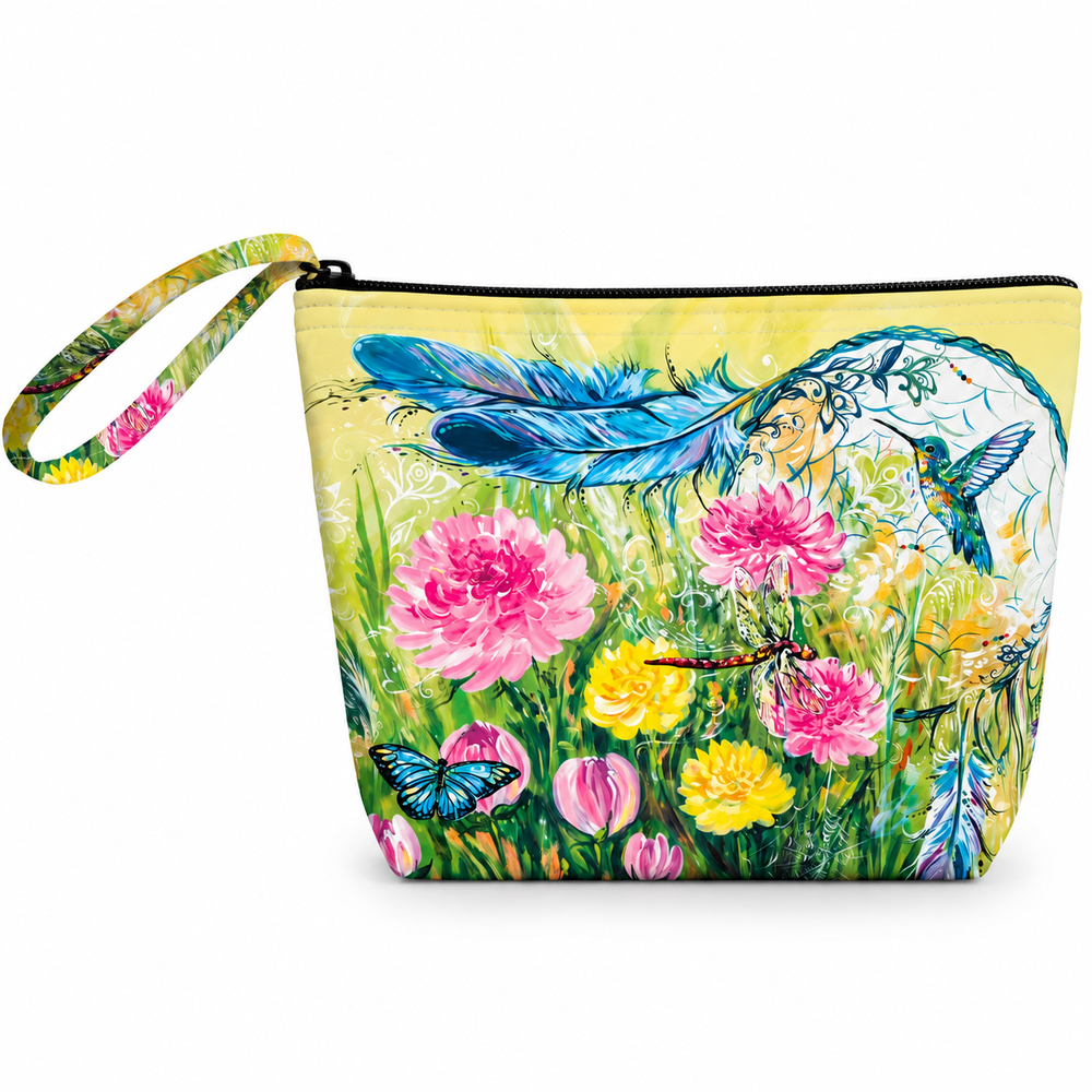 A zippered pouch with a wrist strap, featuring a vibrant watercolor-style floral and bird print on a pale yellow background. The design includes pink and yellow flowers, green leaves, blue feathers, a hummingbird, butterflies, and a crescent moon and sun motif.