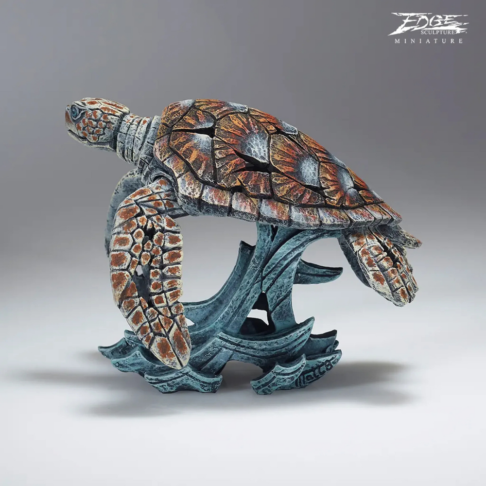 Detailed turtle sculpture on a gray background with 'Edge Sculptures' branding.