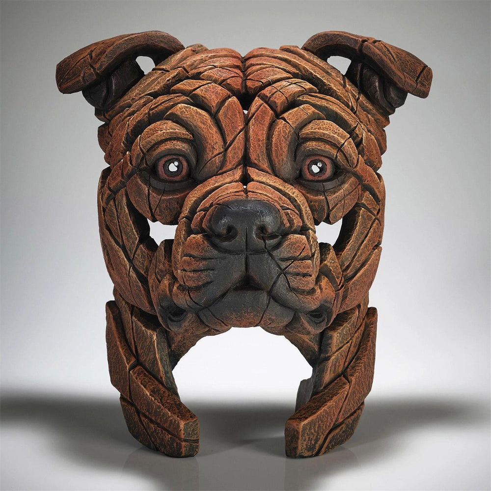  sculpture of a bulldog's head on a gray background