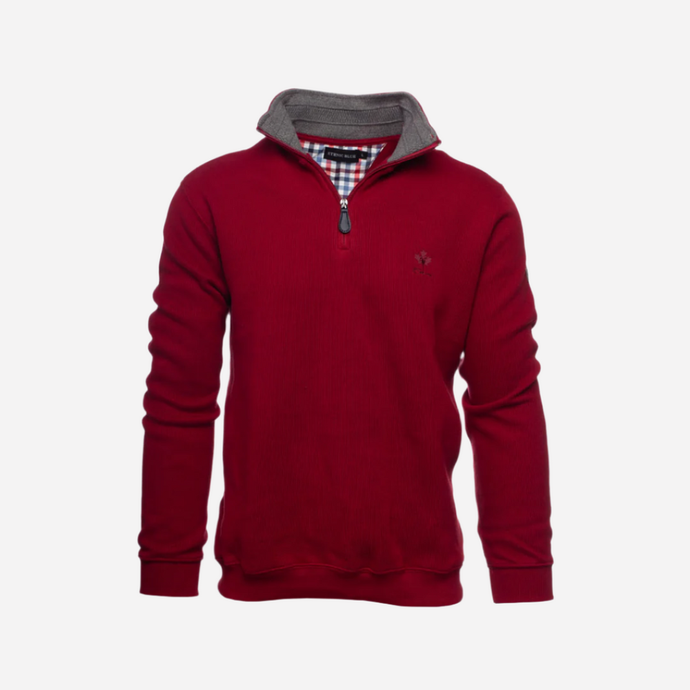 A red men's quarter zip sweater with a checkered pattern on the collar and a visible brand logo on the chest.