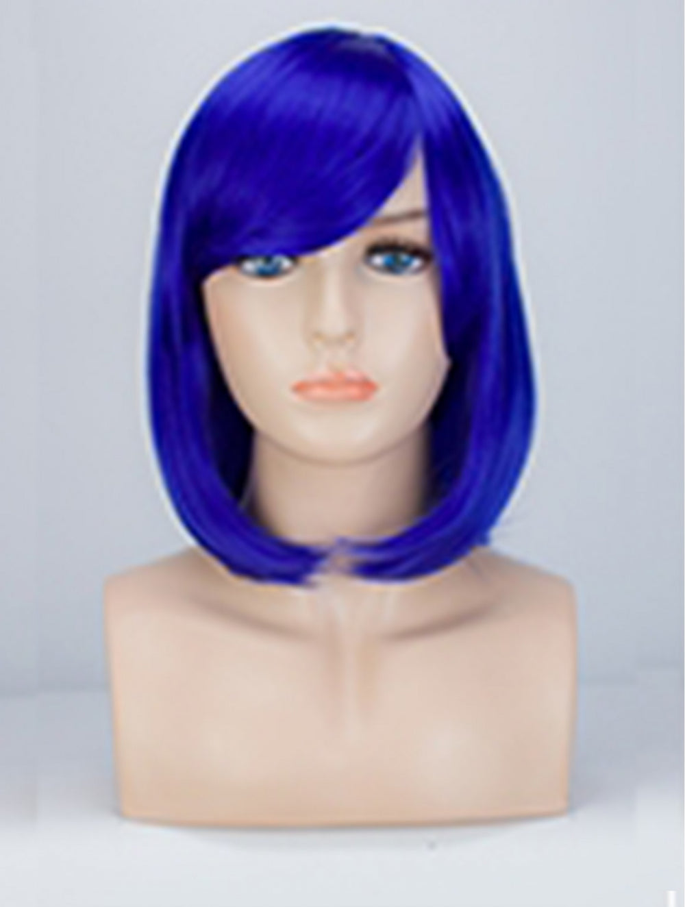 A bright blue bob wig with straight bangs displayed on a beige mannequin head and bust against a light gray background.