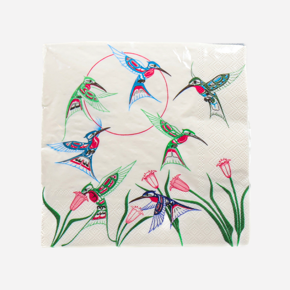 Pack of paper napkins with colorful hummingbird design on a white background