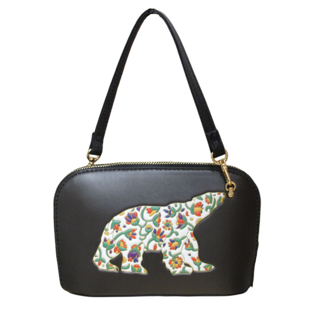Black handbag with a colorful bear design on a white background