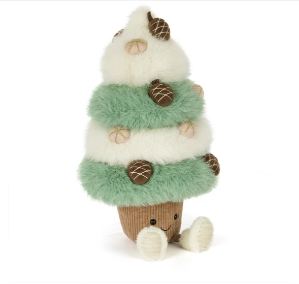 A plush toy shaped like a Christmas tree in an ice cream cone, with fluffy white and mint green layers, brown acorn decorations, and a brown cone base with small white feet, shown on a white background.