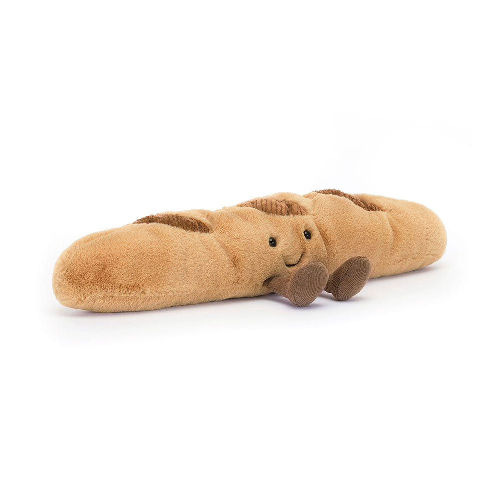 A plush toy resembling a smiling baguette with brown color and cocoa cord boots.