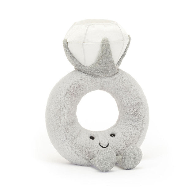 Gray plush diamond ring  with a smiling face on a white background