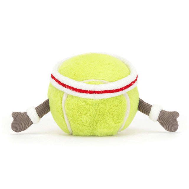 Toy resembling a tennis ball with legs and a headband on a white background