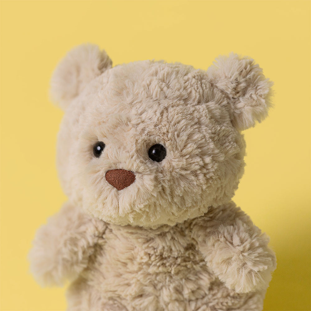 Bartholomew Bear Junior is a charming plush toy from Jellycat, designed as a younger version of the beloved Bartholomew Bear.