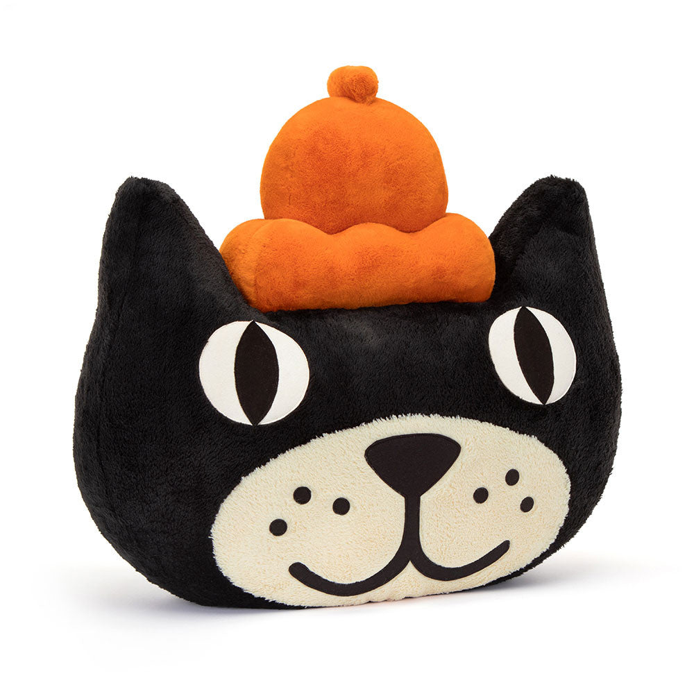 A plush toy depicting a large, black cat with cream suedette highlights wearing a marmalade jelly crown, and bright-eyed pointy-eared details.