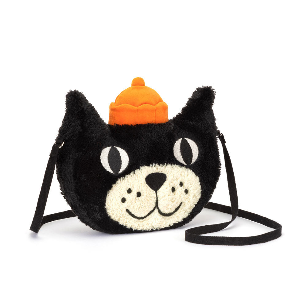 A plush cat-shaped bag with a black body, white face, and an orange hat detail on top.