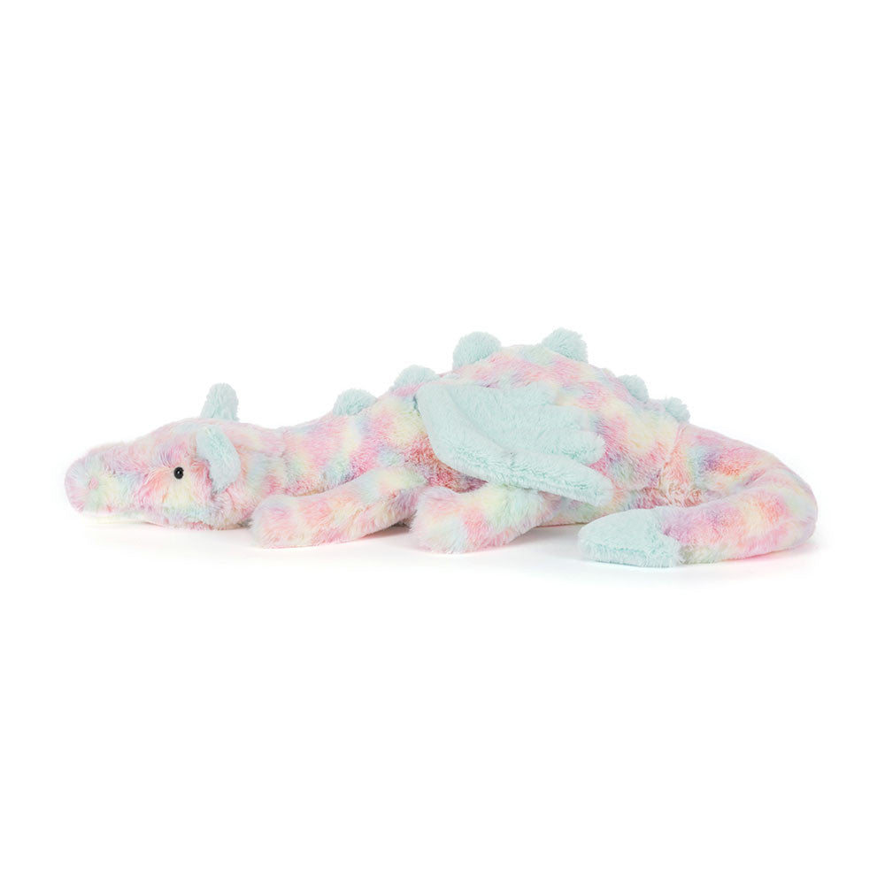 Plush dragon toy with tie-dye pattern on a white background