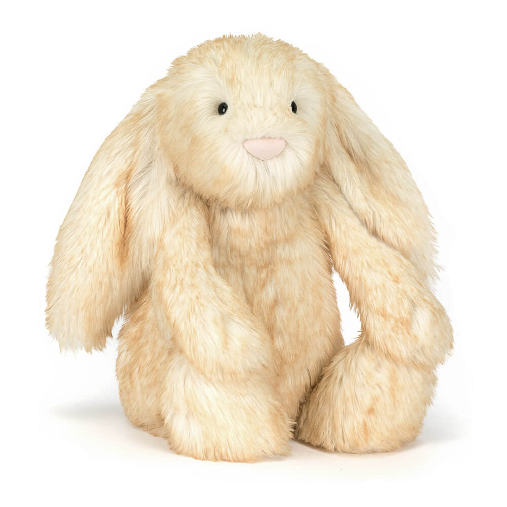 Plush bunny toy on a white background