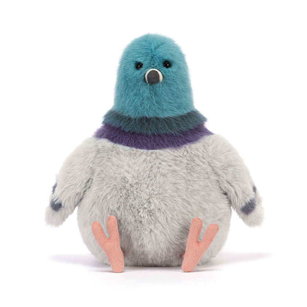Plush toy pigeon with a blue and purple sweater on a white background