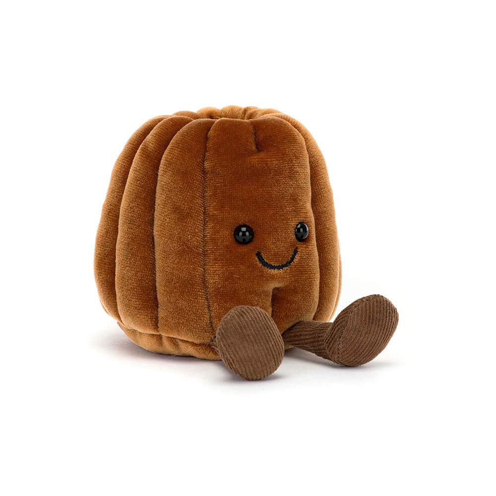 Brown plush toy with a smiling face on a white background