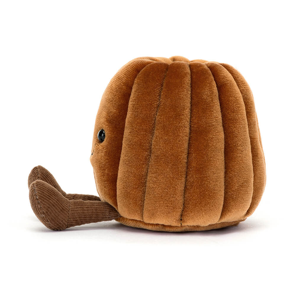 Brown plush toy resembling a shell on a white background