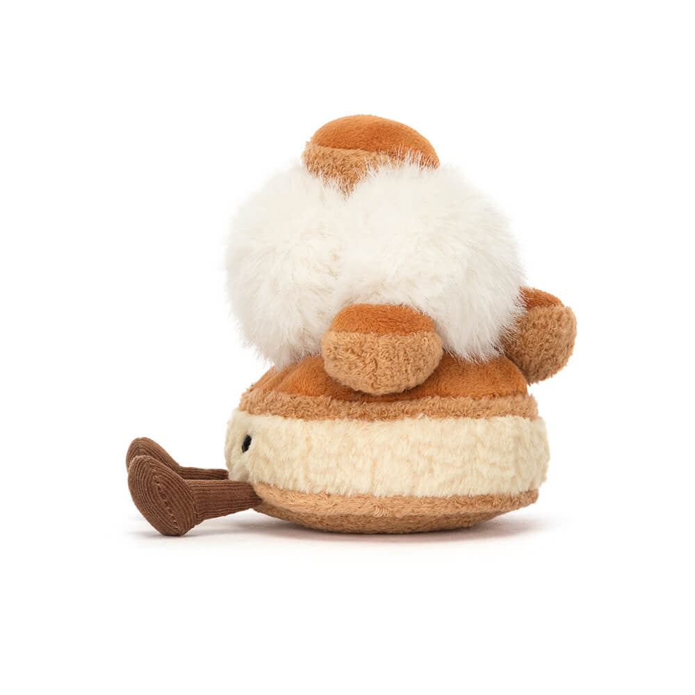 Plush toy resembling a gnome with a white beard on a white background