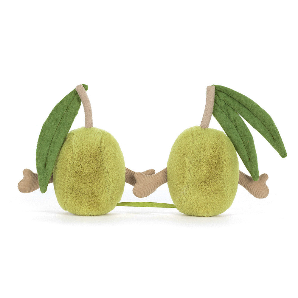 Plush toy shaped like a lime with green leaves on a white background