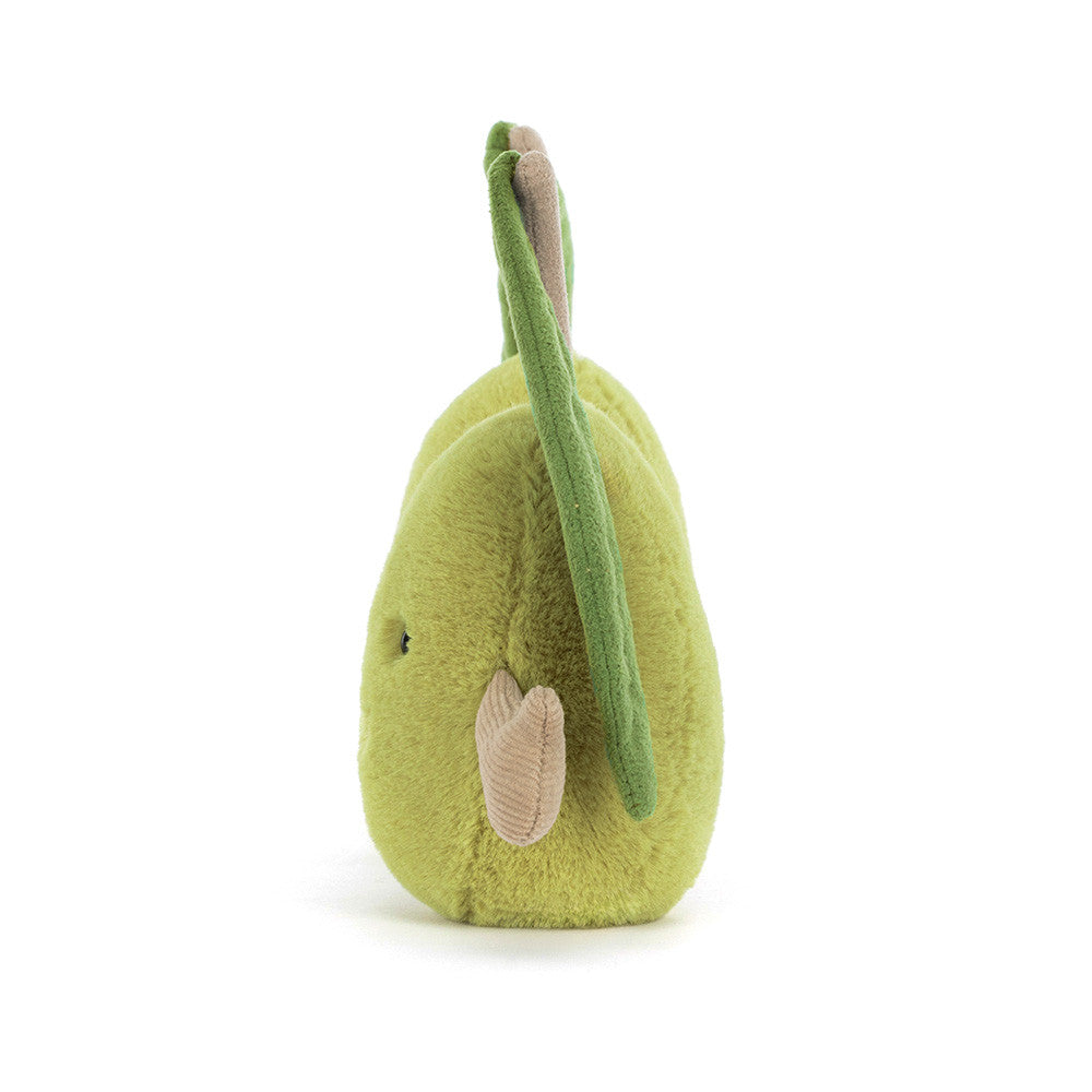 Green plush toy shaped like a pear with bunny ears on a white background