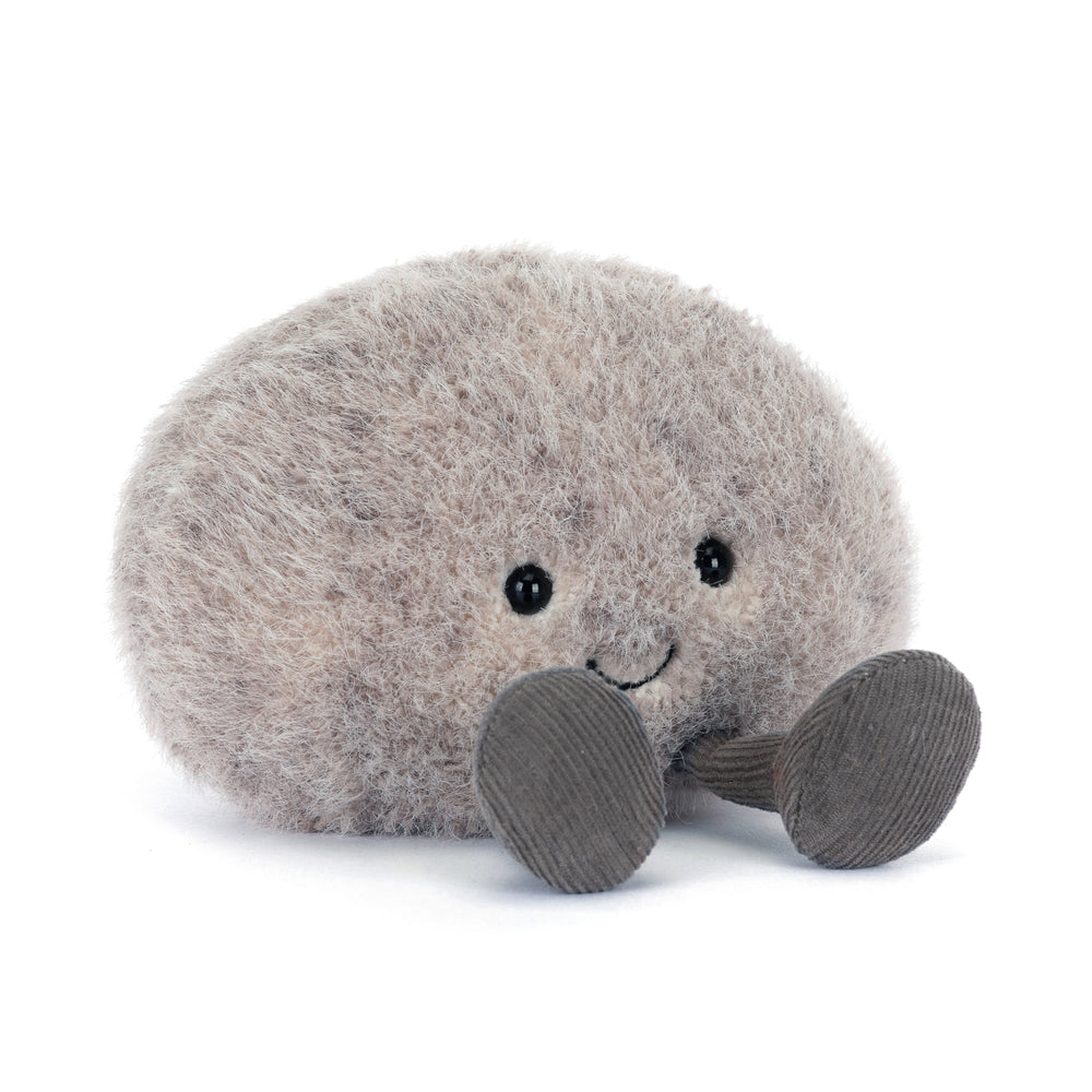 Plush toy  with a smiling face on a white background