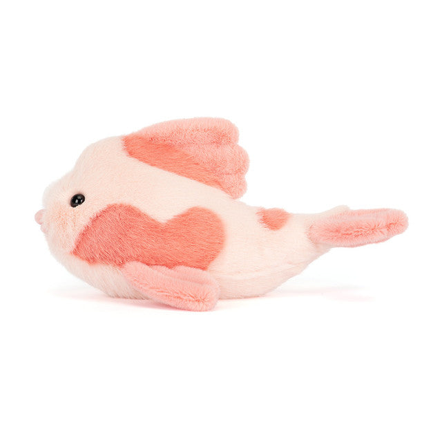 Plush toy fish on a white background