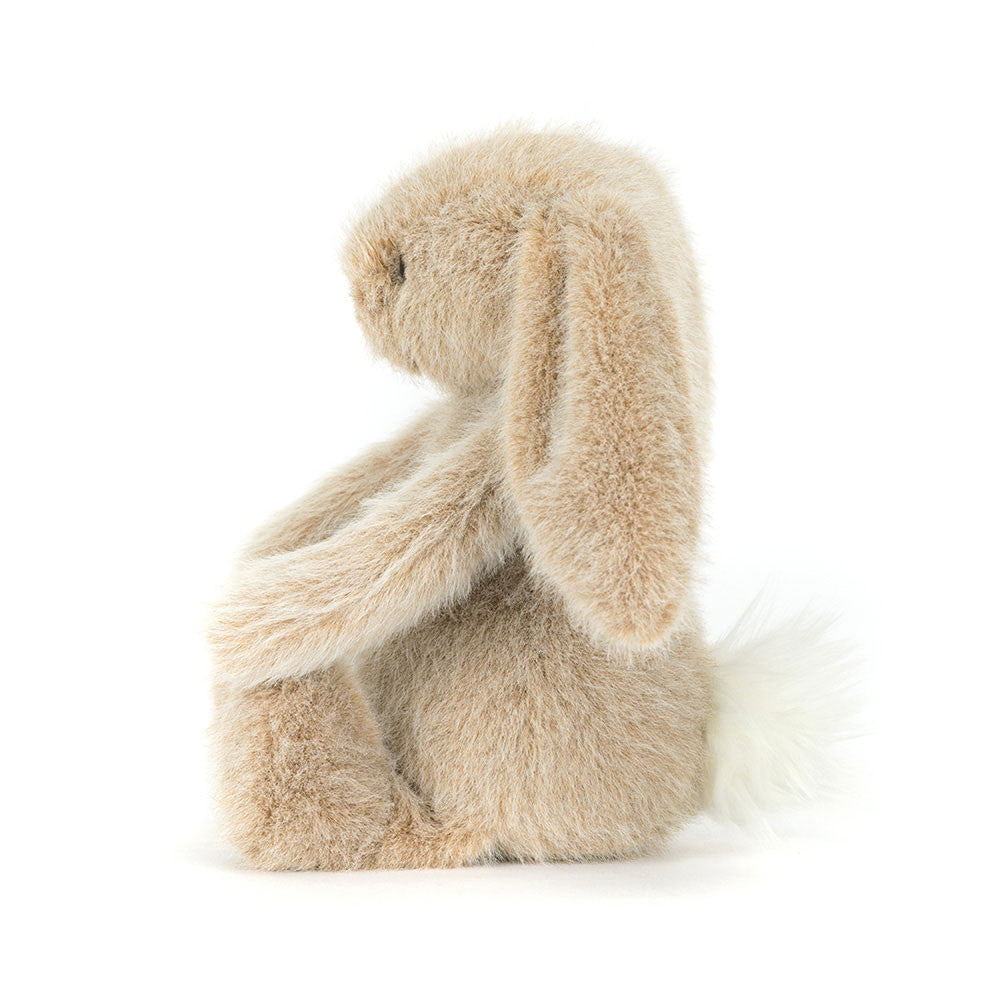 Plush bunny toy on a white background