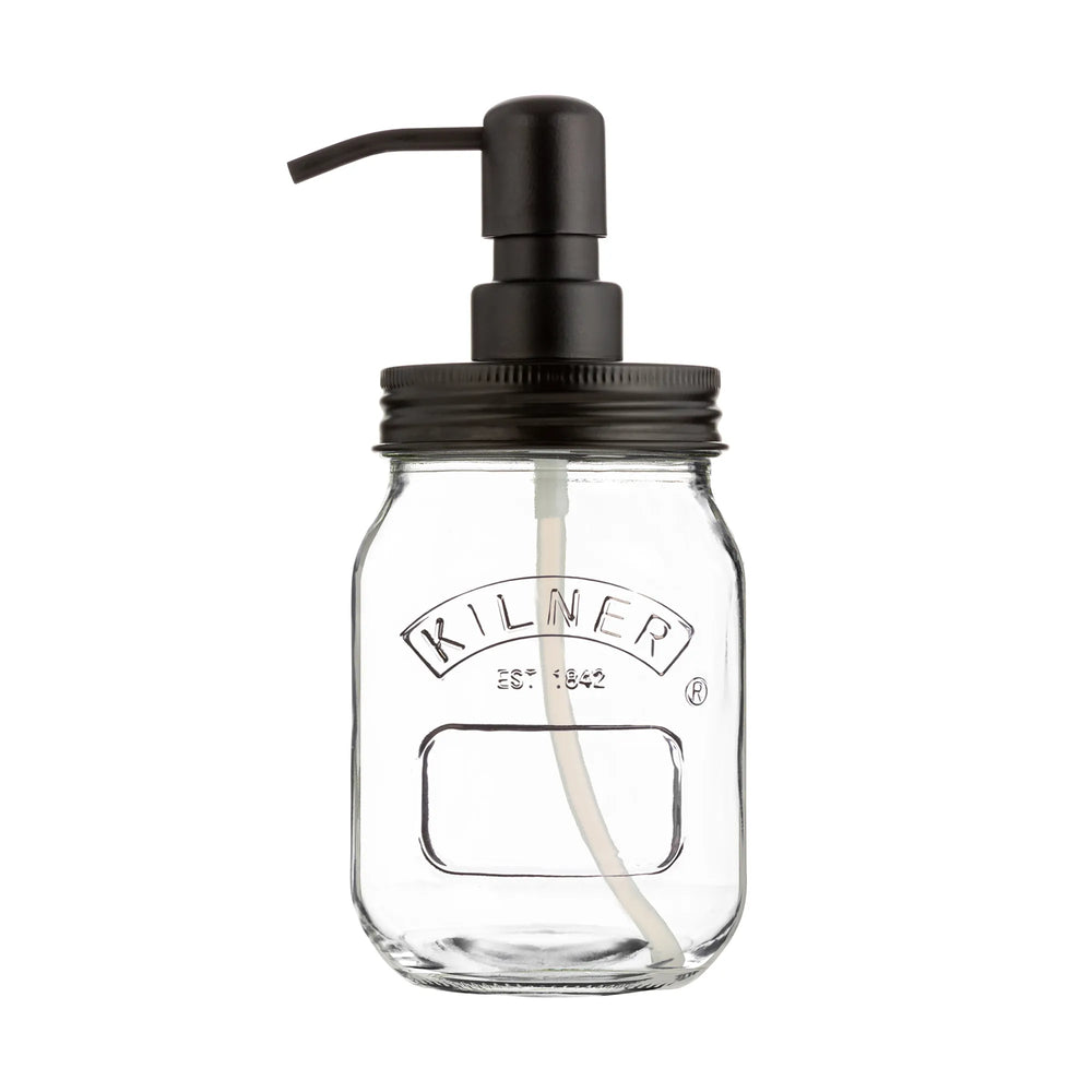 Glass soap dispenser with black pump and lid on a white background
