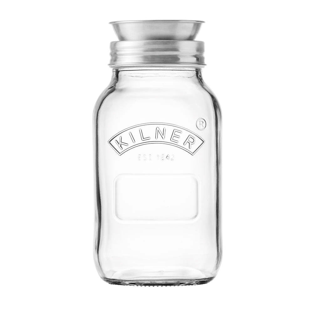 Clear glass jar with silver lid on a white background, featuring the Kilner logo.