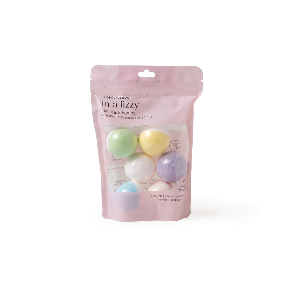 Package of 'in a fizzy' mini bath bombs with colorful spheres on a white background