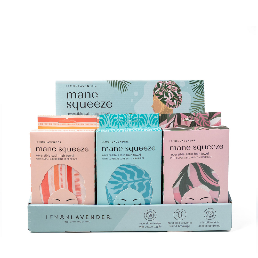Mane Squeeze reversible satin hair towel packaging with colorful designs on a white background