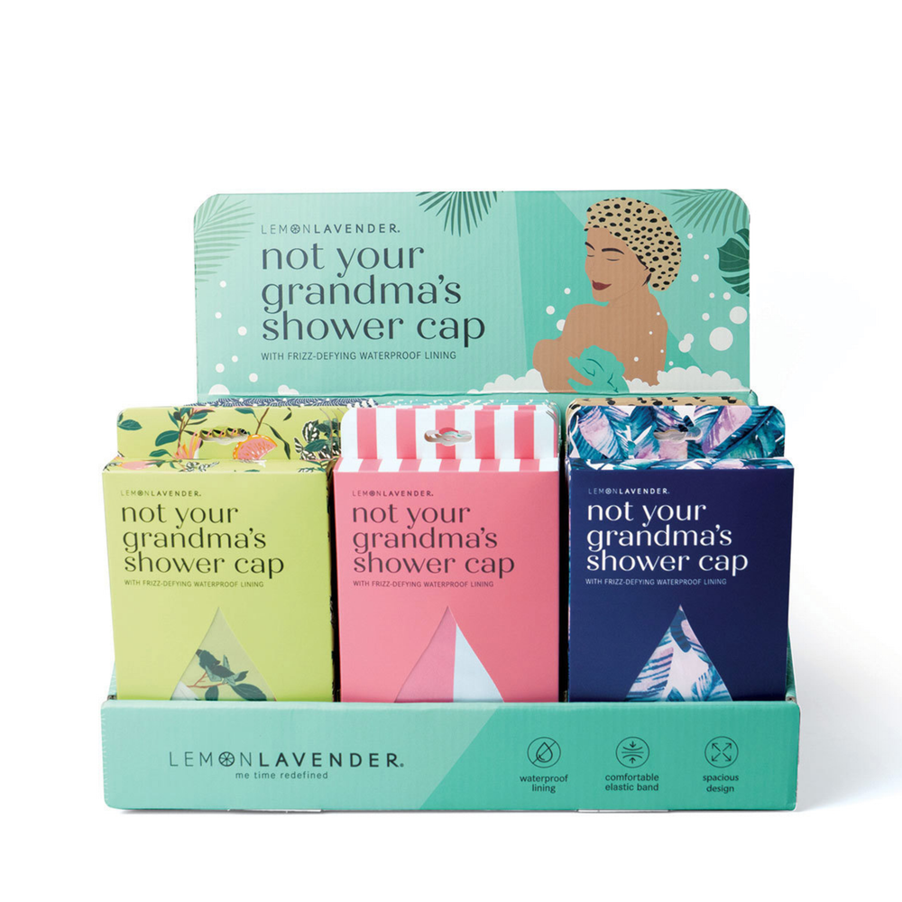 Display of 'not your grandma's shower cap' packaging by Lemon Lavender on a white background.