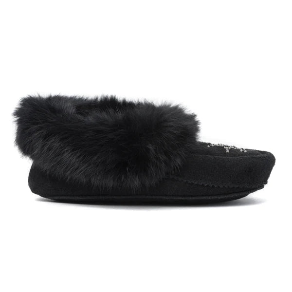 Black suede moccasin with a plush fur lining and bead embellishments on top. 