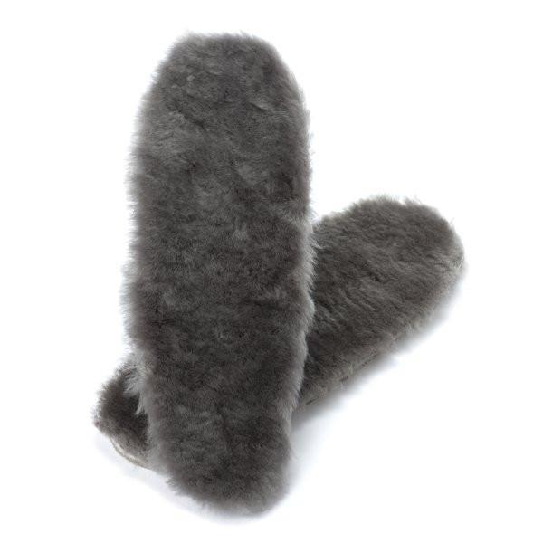 Set of thick sheepskin insoles are displayed against a white background. 