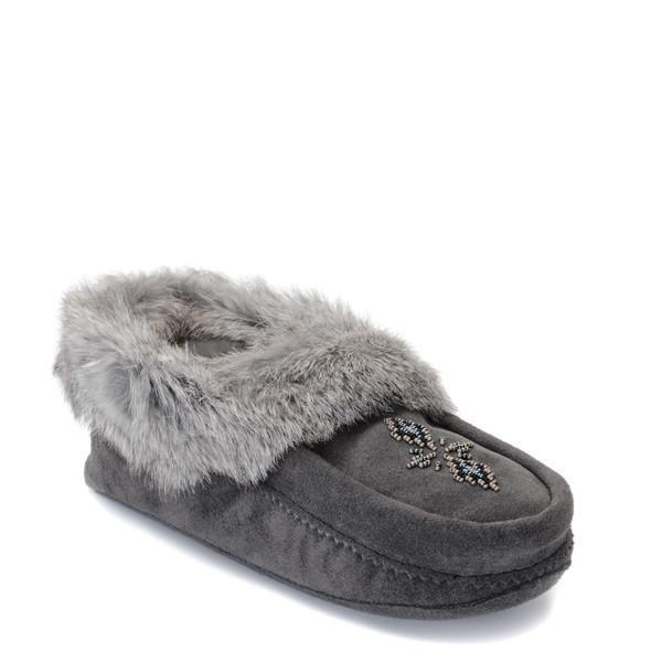 A charcoal moccasin slipper with a fluffy fur lining and a beaded snowflake design on top