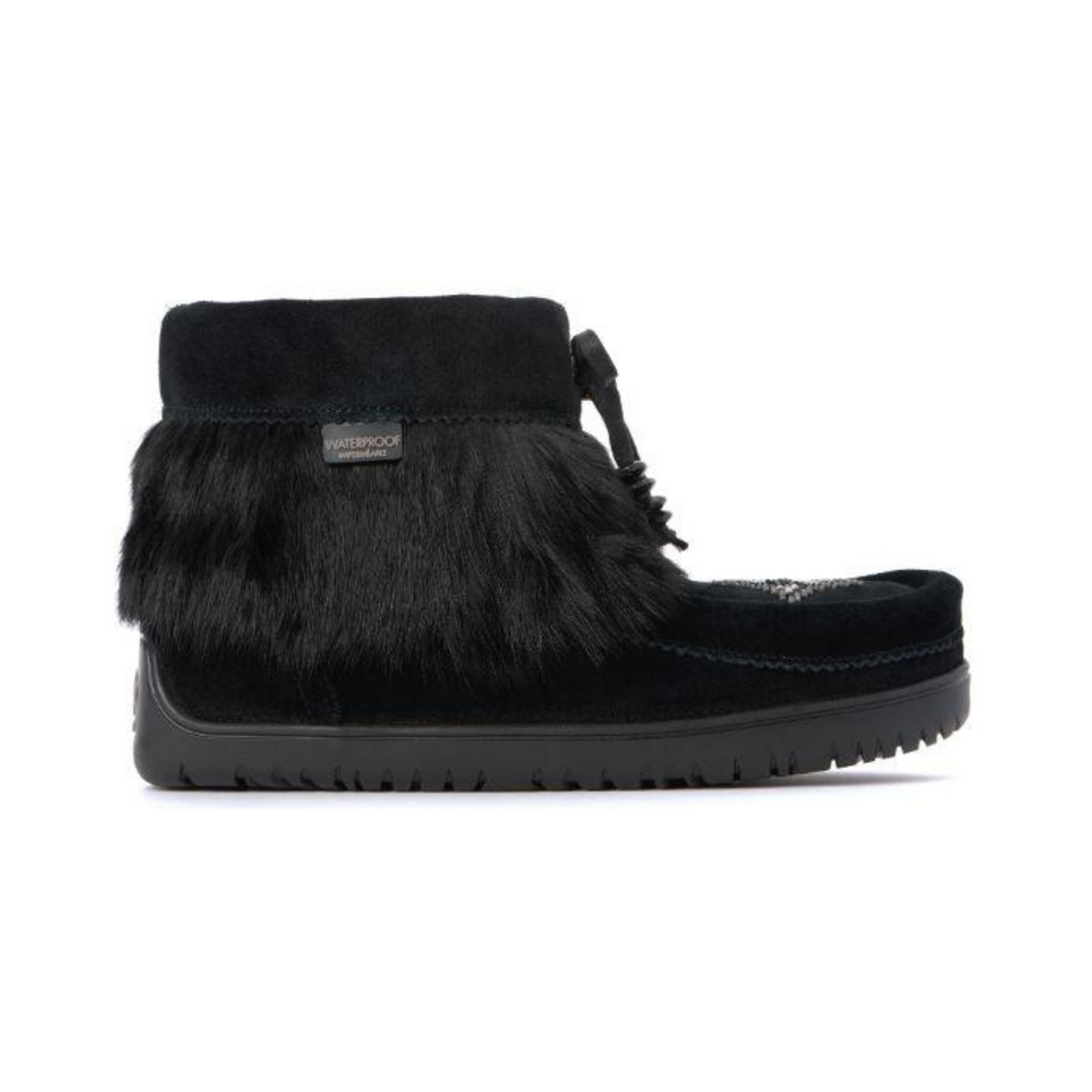 Black suede ankle boot with faux fur trim and waterproof label. Black rubber sole with ridges; lace-tied bow adds a cozy and stylish touch.